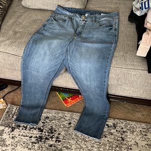 Size 12 New,no tags. Jeans look dark in pictures but they more of a light blue.